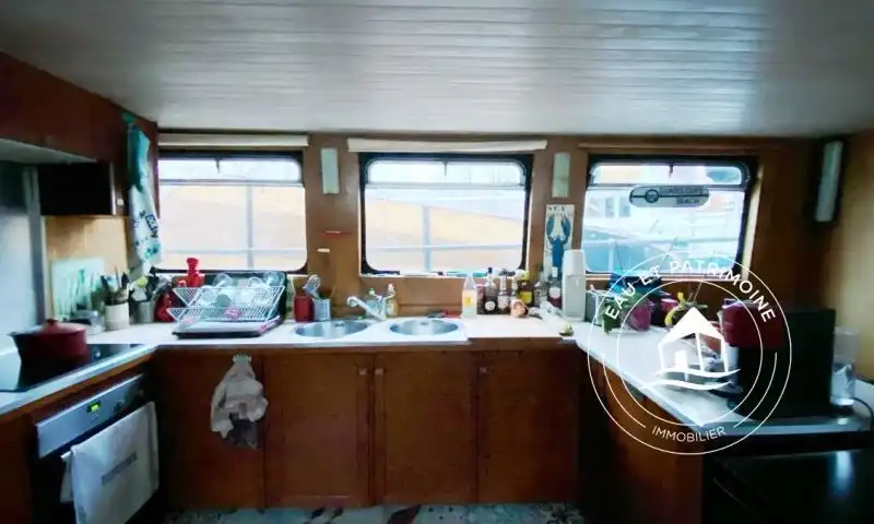 Péniche à vendre Paris 15 – Navigante et Agencement Optimal