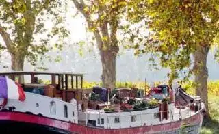 Superbe péniche navigante 120 m² à vendre sur le Canal du Midi