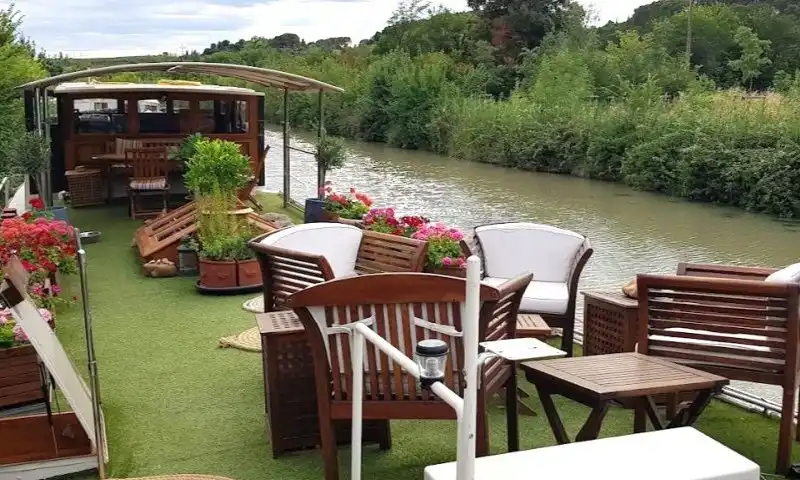 Superbe péniche navigante 120 m² à vendre sur le Canal du Midi