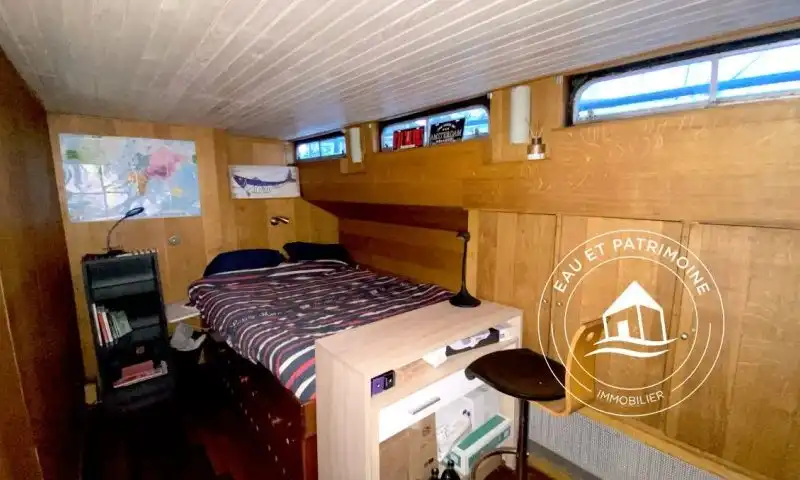 Péniche à vendre Paris 15 – Navigante et Agencement Optimal