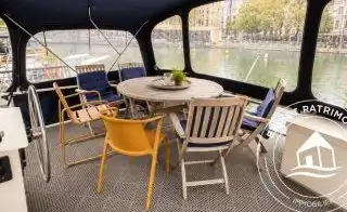 Péniche à vendre Paris 15 – Navigante et Agencement Optimal